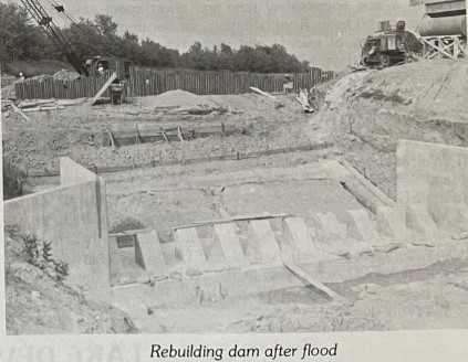 Rebuilding Mill Creek Park Dam after flooding.