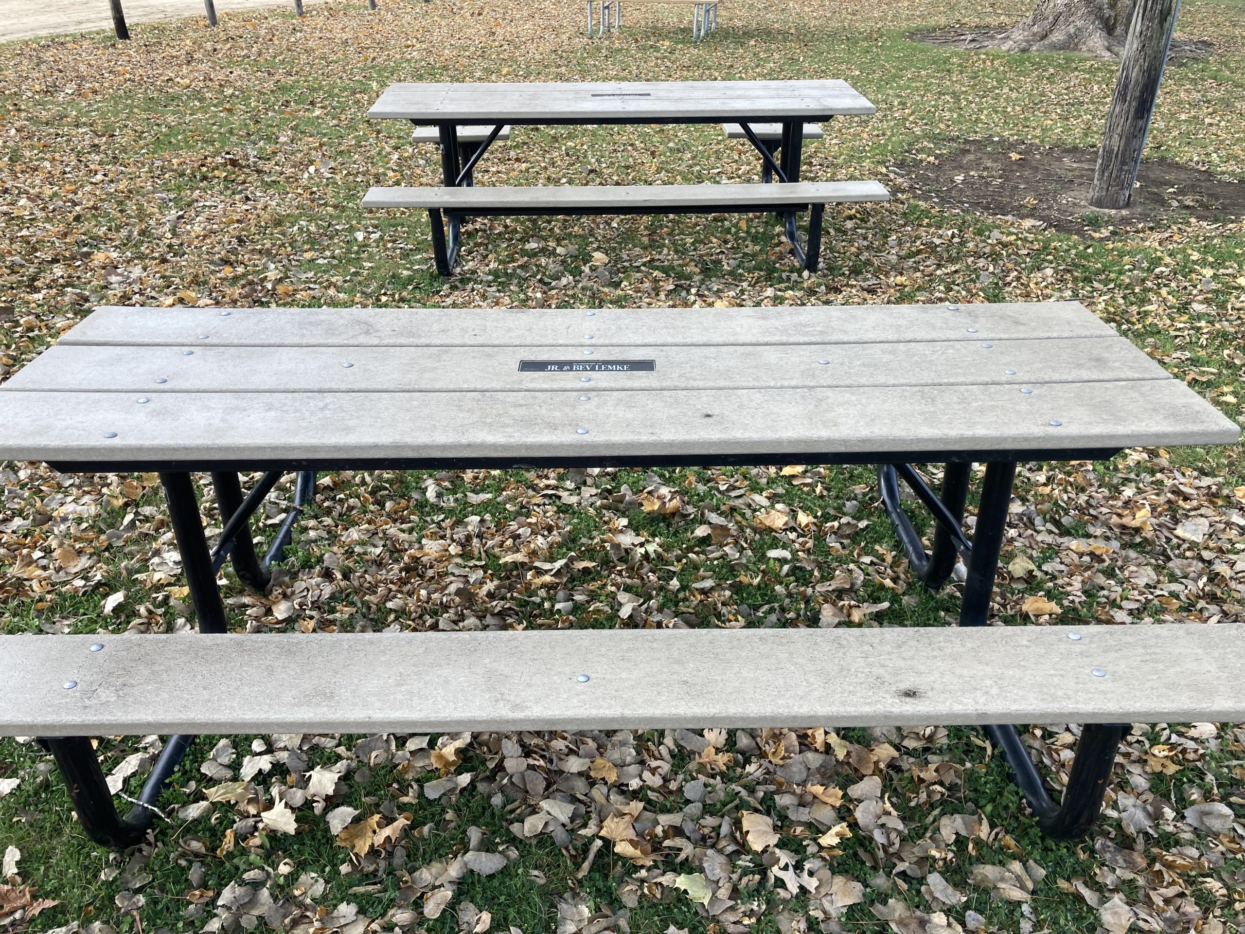 Grey outside table sample that can be purchased for a memorial. Six feet long
