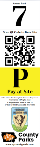 QR code for booking, a yellow 'Pay at Site' sign, contact info, and park logos at the bottom."