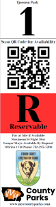 QR code for booking, a red 'Reservable' sign, contact info, and park logos at the bottom."
